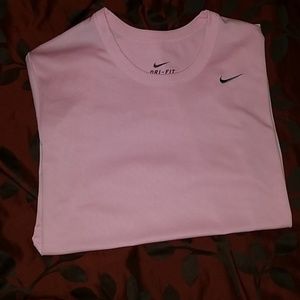 Pink Nike Dri-FIT shirt